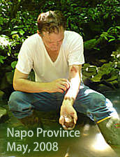 Applying red clay for 'protection' - Napo Province, Ecuador - May 15, 2008